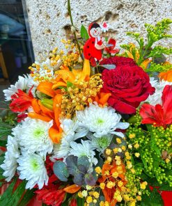 Ramo de flores variado tonos naranjas